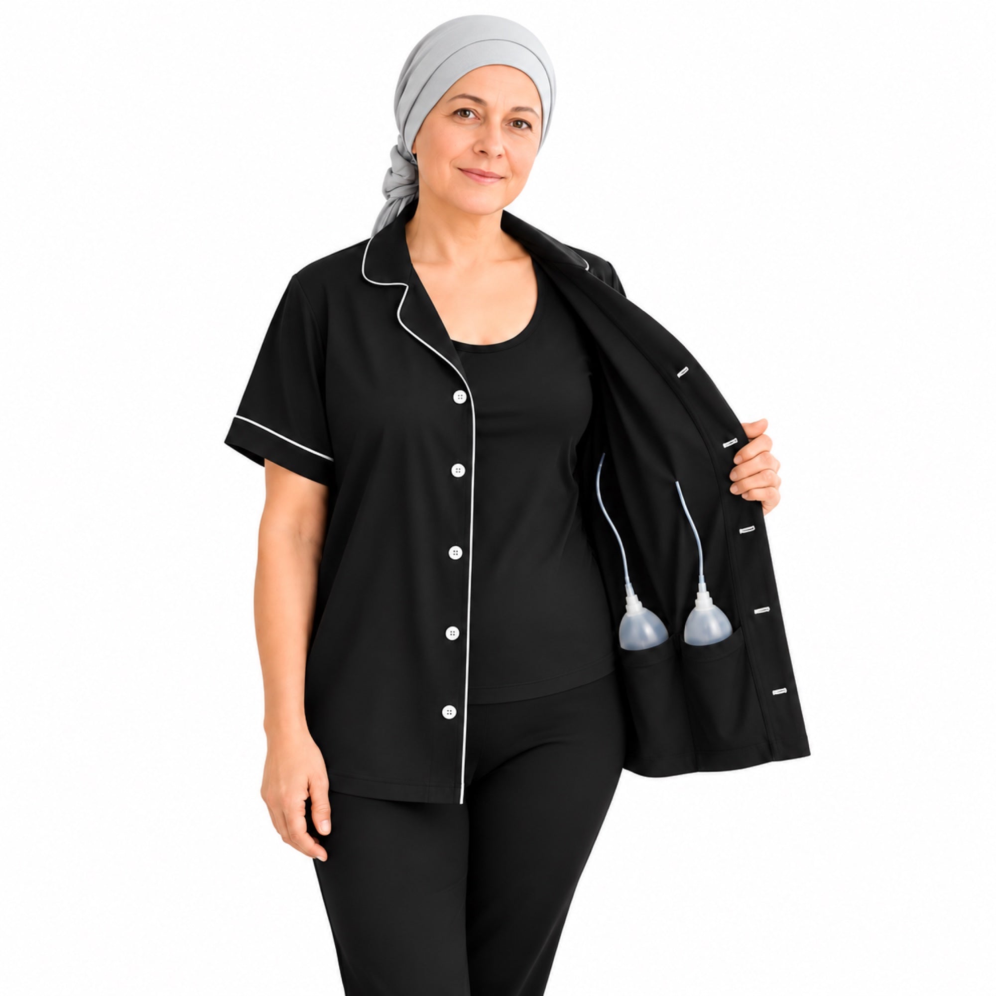 Black women's lapel post-mastectomy recovery shirt with white piping and two drain bulbs